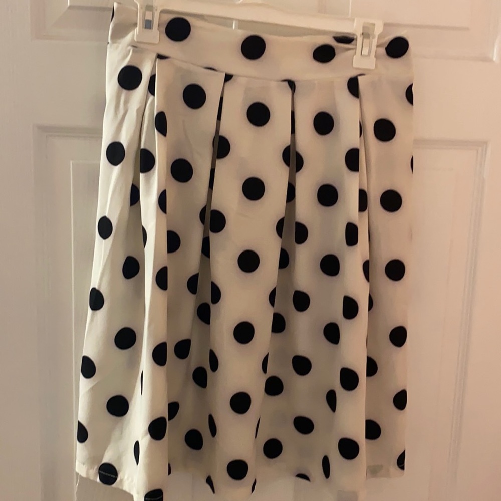 Worn a couple times. Can also fit into a large.